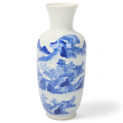 191 - A Chinese blue and white porcelain baluster vase, with painted mountain landscape, 4 character mark,... 