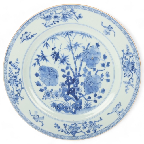 193 - A Chinese blue and white porcelain plate, with painted botanical design, diameter 27cm