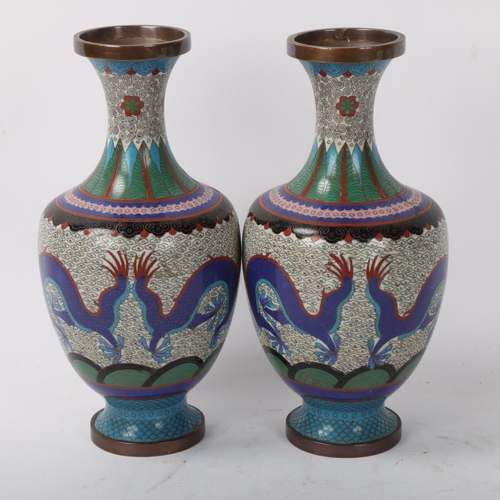 207 - A pair of Chinese cloisonne enamel dragon design vases, height 23cm