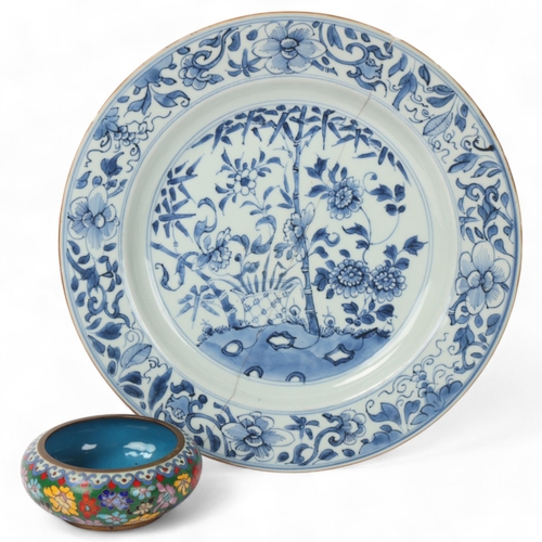 211 - A Chinese blue and white porcelain plate, diameter 28cm, A/F, and a small cloisonne enamel bowl, dia... 