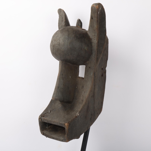 226 - Bamana (West Africa) carved wood Tribal mask, on metal stand, overall height 58cm