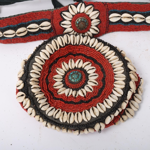 228 - An African Tribal cap and belt, with cowrie shell and coral bead decoration (2)