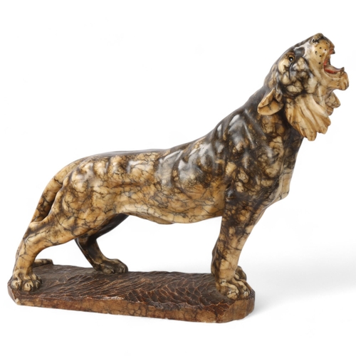 229 - A large Italian carved marble/alabaster snarling tiger, length approx 55cm