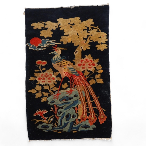 290 - An Antique Chinese Tao Poa 'Phoenix/Peacock' wool rug, 127cm x 72cm