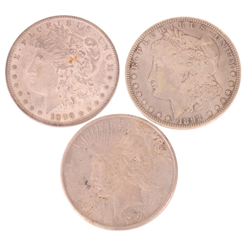 44 - Three America silver Dollar coins, 1892, 1896, 1922