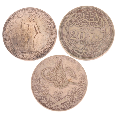 50 - A Queen Victoria 1898 silver Hong Kong Dollar, diameter 40mm, 27.1g, together with an Egyptian 20 Pi... 