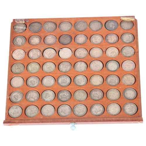 69 - A collectors tray of British silver Shilling coins, earliest 1697 latest 1951, 8 coins pre Victorian... 