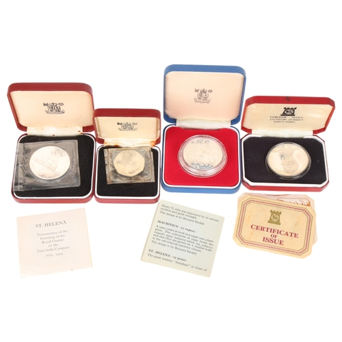 87 - 4 modern commemorative silver coins, cased