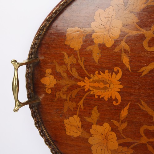 274 - An Edwardian marquetry inlaid oval tea tray, with brass gallery, length 67cm