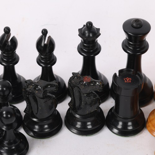 278 - Staunton pattern boxwood and ebonised chess set, impressed red coronet markings, King height 7.5cm