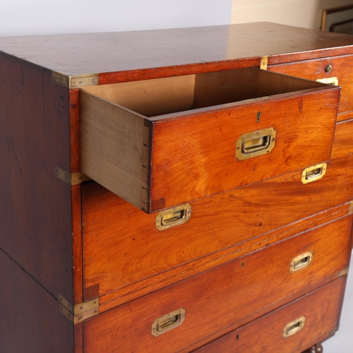 174 - A 19th century brass-bound mahogany military chest of drawers in 2 sections, with recessed brass han... 