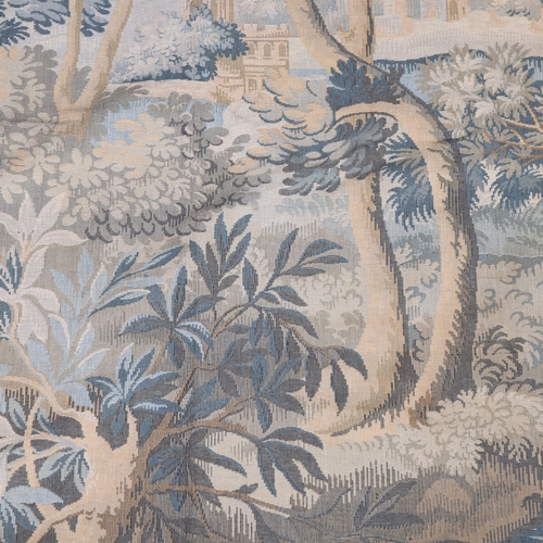 289 - A large French machine-woven verdure wall-hanging tapestry, Continental hillside village, 190cm x 13... 