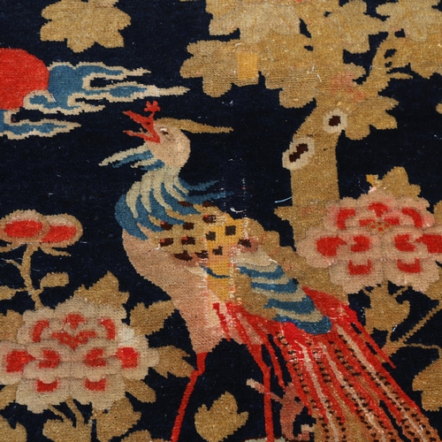 290 - An Antique Chinese Tao Poa 'Phoenix/Peacock' wool rug, 127cm x 72cm