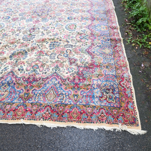 291 - A large Persian Aalam ivory ground wool rug, 500cm x 315cm