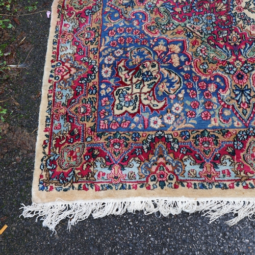 291 - A large Persian Aalam ivory ground wool rug, 500cm x 315cm