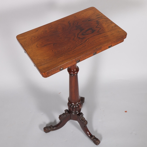 294 - A 19th century rosewood table on carved tripod base, 42cm x 27cm, height 77cm