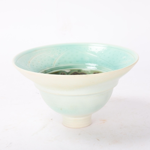 401 - GEOFFREY SWINDELL (born 1945); a small porcelain bowl covered in layers of glaze, slip and oxides, i... 