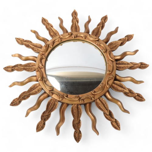 409 - A mid 20th century convex sunburst mirror, signed to rim STALLIC, diameter 57cm