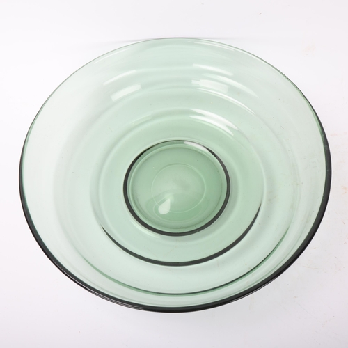 414 - A mid 20th century large green ribbed glass bowl and polished pontil base in the style of Whitefriar... 