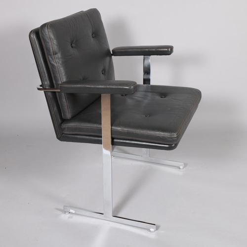 416 - ROBIN DAY, a mid-century Hille Delphi leather and chrome armchair or desk chair on T shaped legs, wi... 