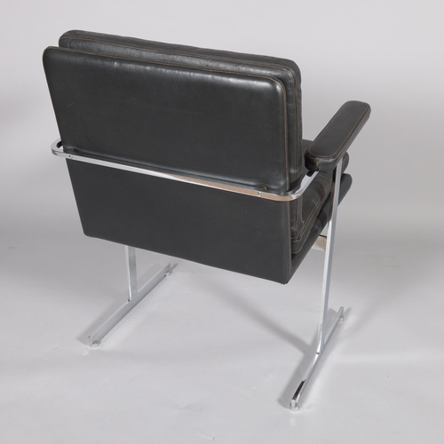 417 - ROBIN DAY, a mid-century Hille Delphi leather and chrome armchairor desk chair on T shaped legs, wit... 