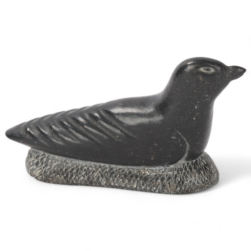 419 - A Mid 20th Century Inuit green stone carving of a bird, signed AH and numbered 3295 -'79 with makers... 