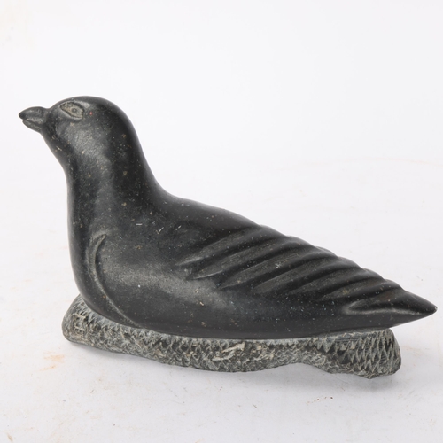 419 - A Mid 20th Century Inuit green stone carving of a bird, signed AH and numbered 3295 -'79 with makers... 