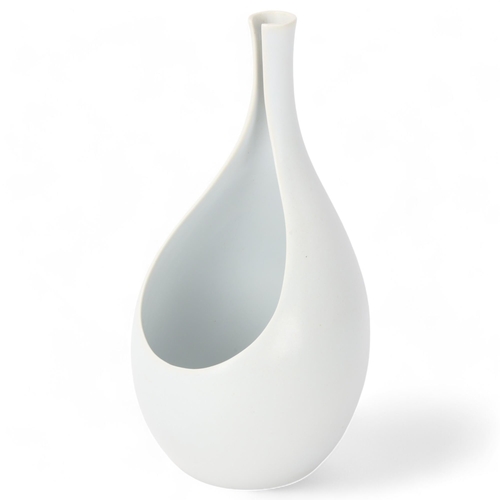 424 - STIG LINDBERG (1916-1981) for Gustavsberg, Sweden, a 1950s' designed white glaze Pungo vase, makers ... 