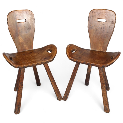 428 - A pair of mid-century French brutalist chairs, the shaped seats with integral handles, height 80cm