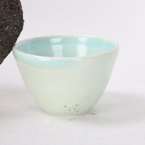 435 - LICY CLAYDON, a black textured stoneware vessel, with red glazed interior and a small celadon glazed... 