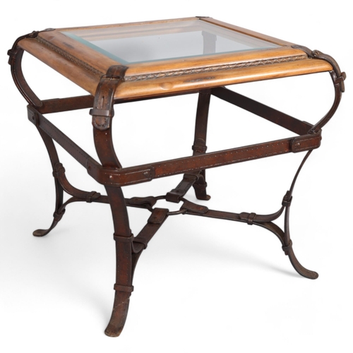 438 - A trompe l’oeil wrought-iron coffee table in the manner of JACQUES ADNET for Hermes in wood and leat... 