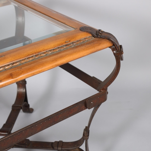 439 - A trompe l’oeil wrought-iron coffee table in the manner of JACQUES ADNET for Hermes in wood and leat... 