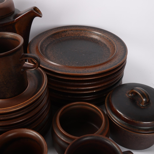 451 - Arabia Finland, a brown stoneware dinner service, 57 pieces