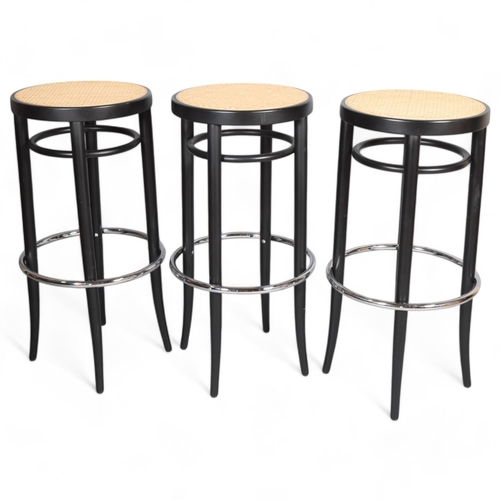 454 - A set of 3 contemporary Thonet bentwood and chrome stools with cane top, with maker’s labels, curren... 