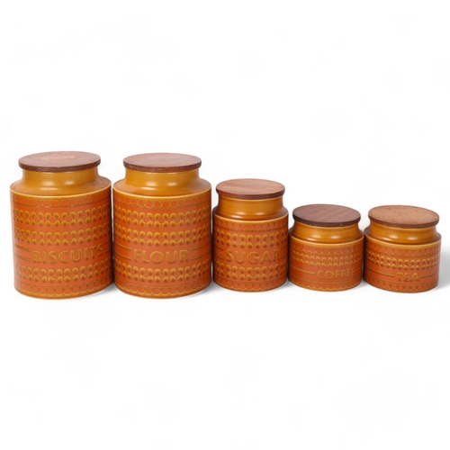 491 - A set of 5 Hornsea storage jars with wooden lids, makers marks to base