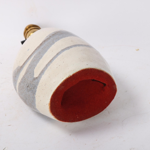 494 - PETER ELLERY, a 1970s' ceramic pebble form lamp base, makers mark to base, base height 20cm