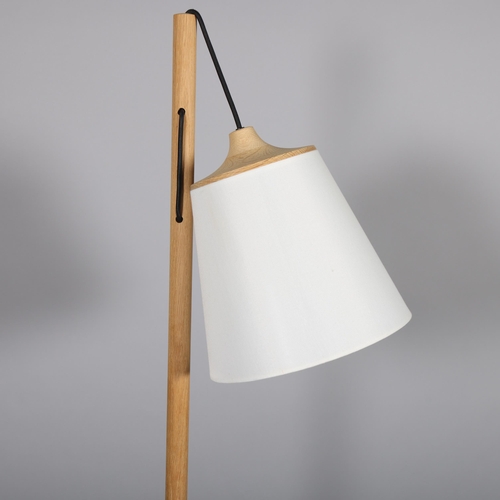 499 - A Muuto Pull floor lamp, the oak stand supporting a pendant oak mounted shade, in working order with... 