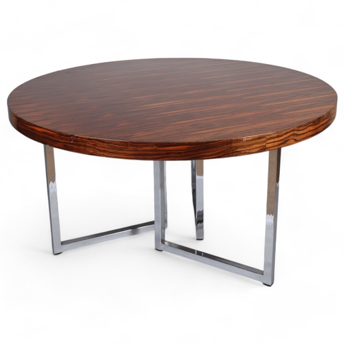 506 - A 1970s' dining table by GORDON RUSSELL, with polished chrome frame, height 73cm, diameter 137cm