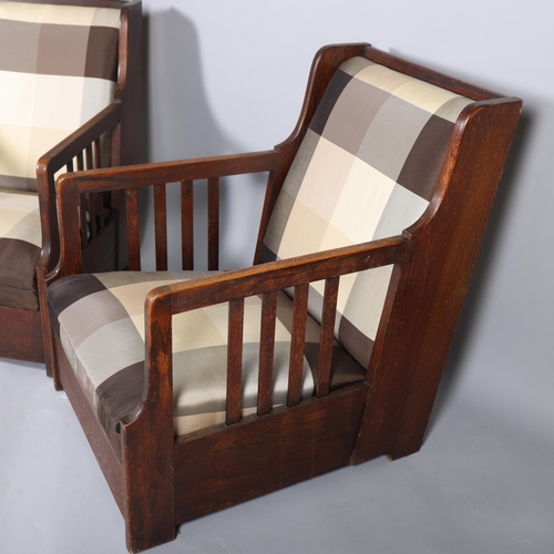 518 - Manner of CARL WESTMAN (1866-1936), a pair oak Arts and Crafts lounge chairs, the straight sides wit... 