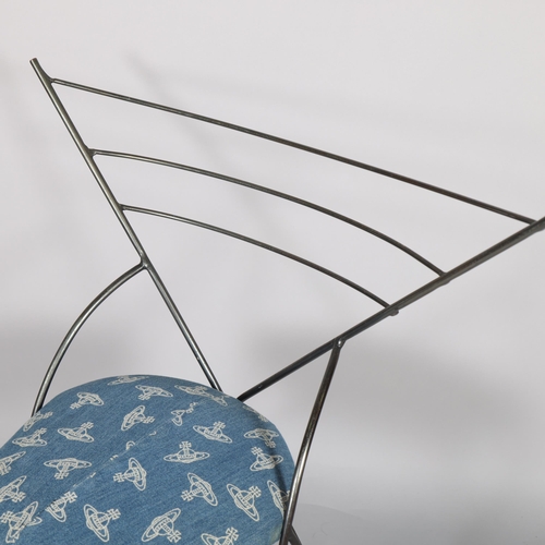 522 - A post-modern steel rod chair with triangular back and Vivienne Westwood upholstered seat, height 80... 