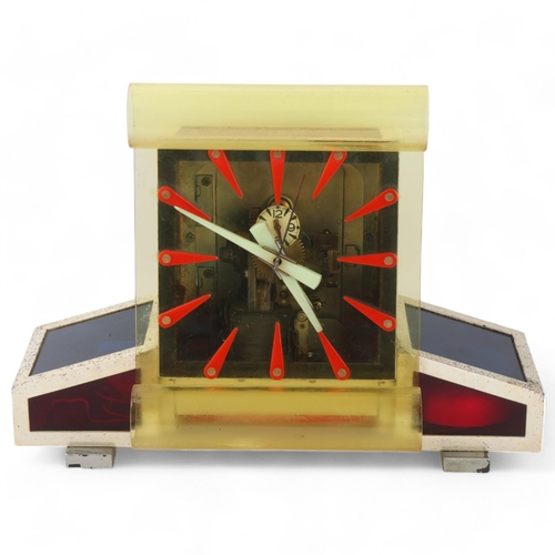 532 - A mid 20th century hand-built electric clock, chromed aluminium case with coloured acrylic panels an... 