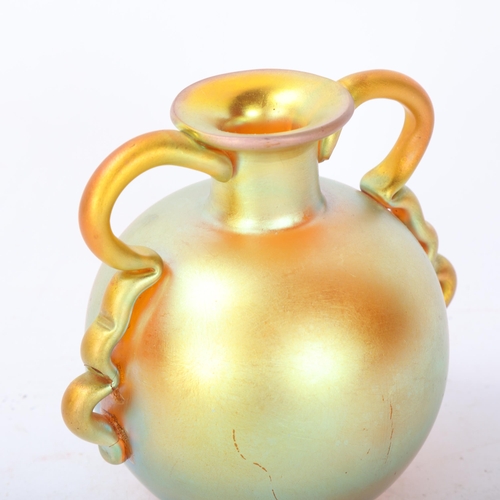 533 - WMF - An early 20th century Myra-krystall 2 handled globular glass vase with gold and purple iridesc... 