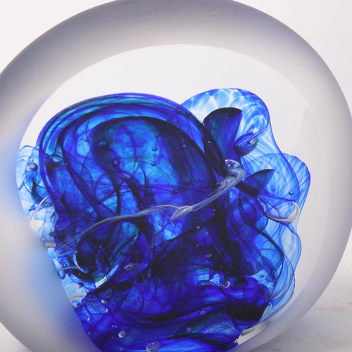 549 - JANE CHARLES, a studio glass paperweight with blue internal layered glass, signed to base, height 12... 