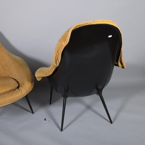 554 - A pair of Lurashell fibreglass lounge chairs, circa 1960s', black fibreglass bodies with ebonised wo... 