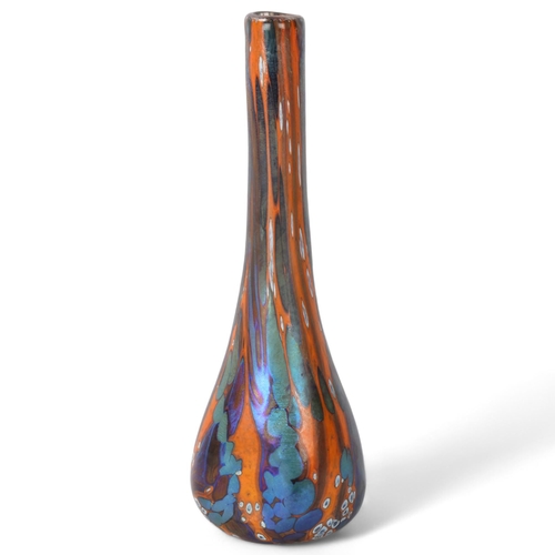 559 - A vintage hand blown art glass vase with iridised multi coloured surface, height 33cm