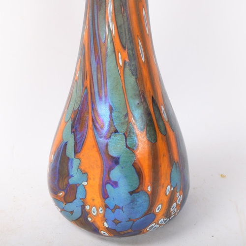 559 - A vintage hand blown art glass vase with iridised multi coloured surface, height 33cm