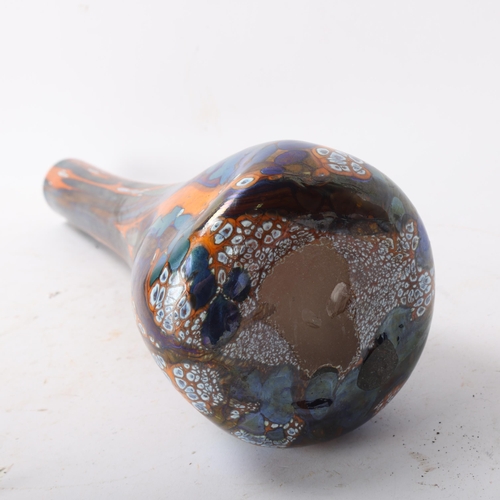 559 - A vintage hand blown art glass vase with iridised multi coloured surface, height 33cm