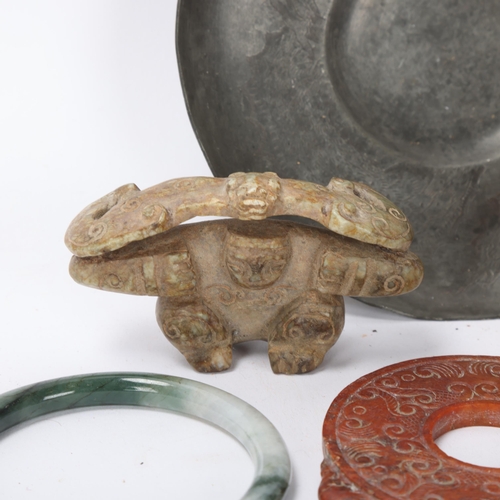 300 - A group of Chinese carved jade and hardstone items, and a Chinese pewter dish (6)