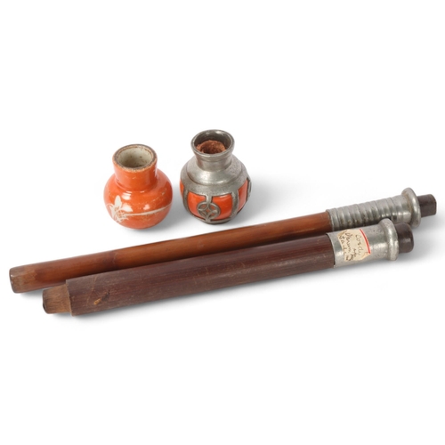 301 - 2 porcelain topped opium pipes, with metal-mounted wood pipes (2)