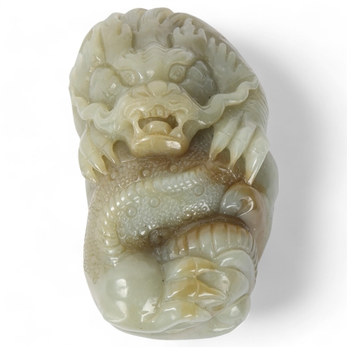 309 - A Chinese relief carved jade dragon design boulder, length 9cm